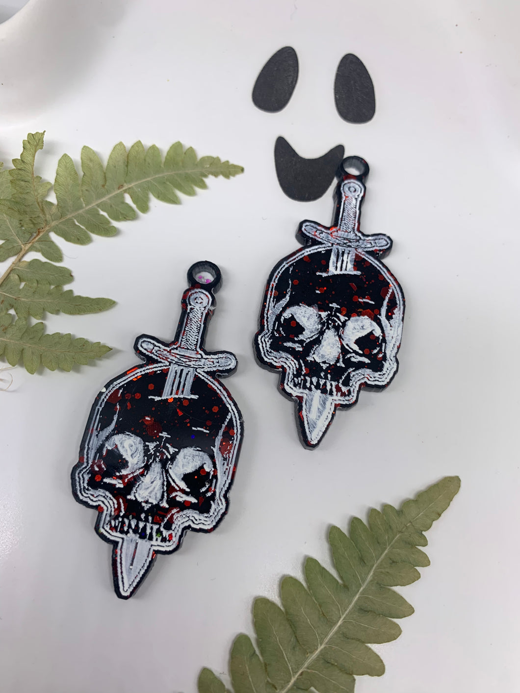 Red and black skull dagger earrings