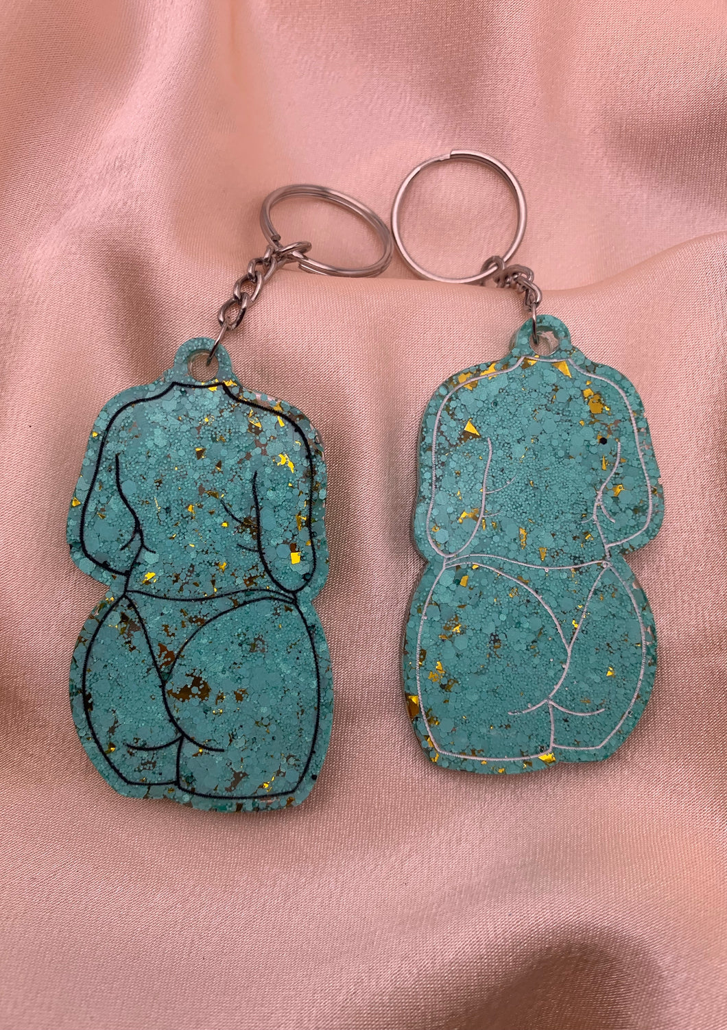 Gold and turquoise lady keychains