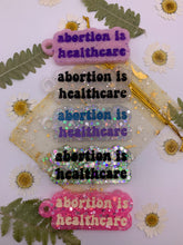 Load image into Gallery viewer, Abortion is healthcare keychains
