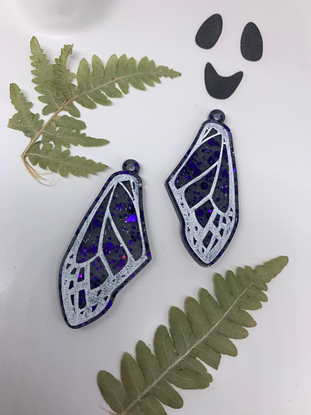 Purple and black wing earrings