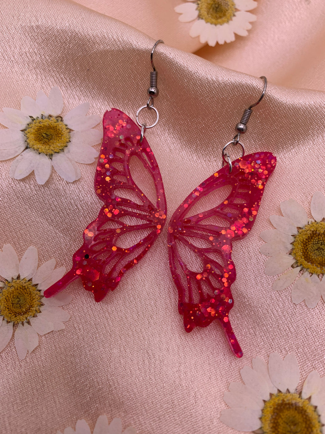 Hot pink glitter butterfly wing earrings
