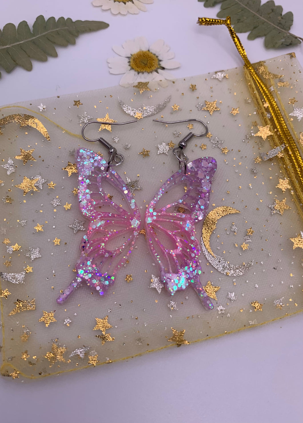 Purple and pink glow in the dark butterfly wing earrings
