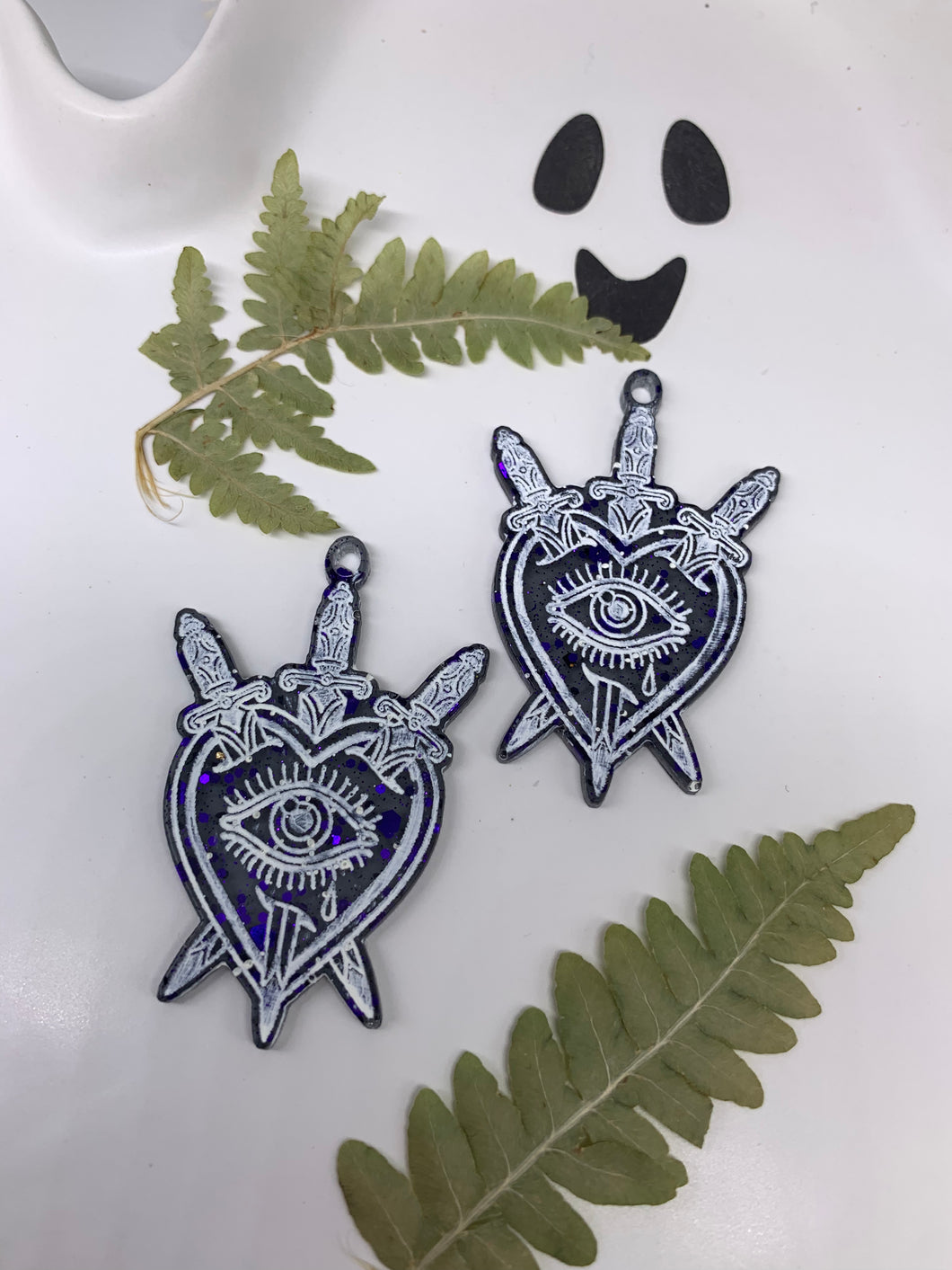 Purple and black heart dagger earrings