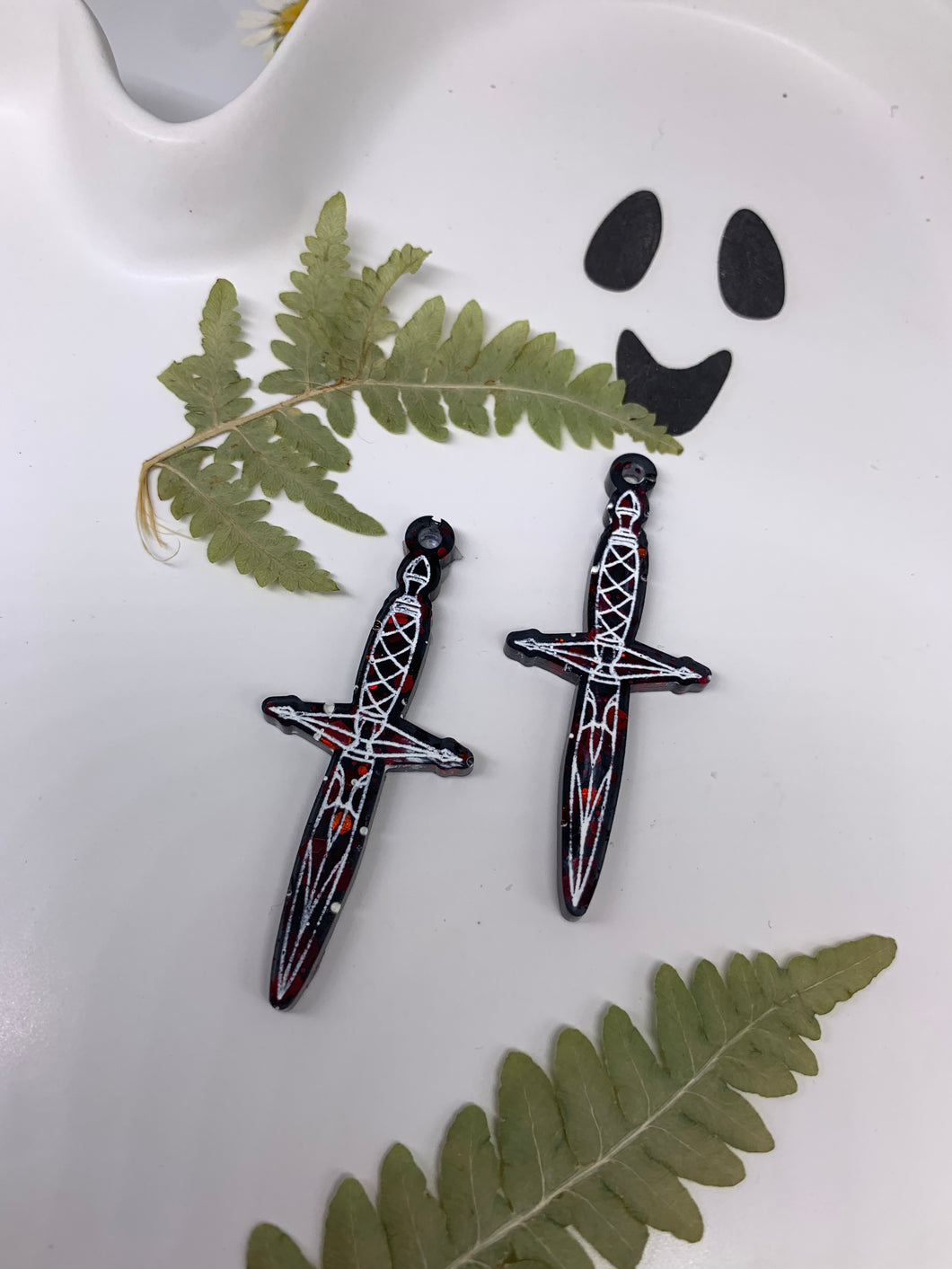 Red and black dagger earrings