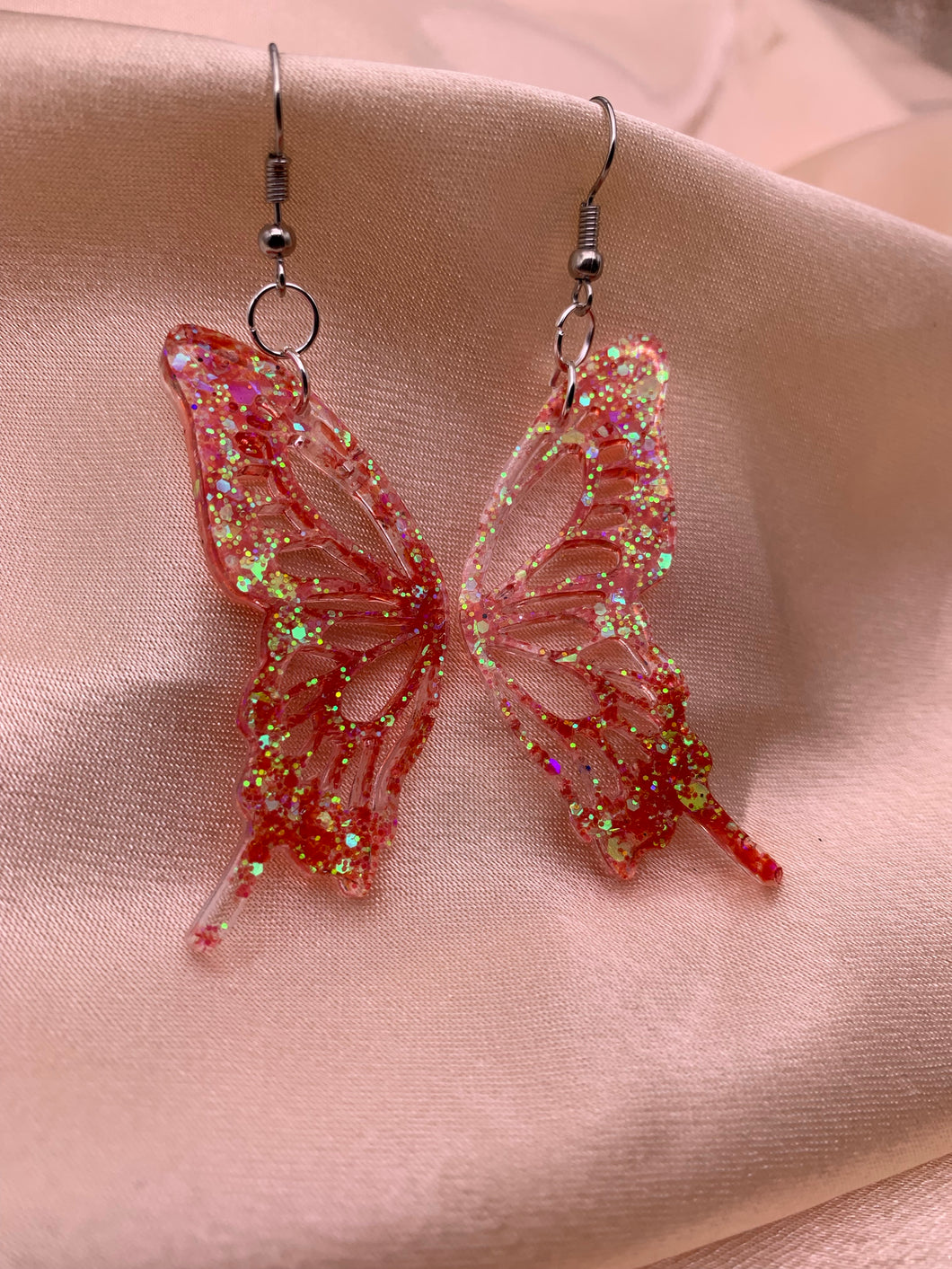 Red iridescent butterfly wing earrings