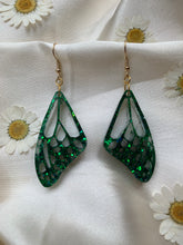 Load image into Gallery viewer, Dark glittery green wing earrings
