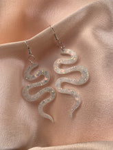 Load image into Gallery viewer, White iridescent snake earrings
