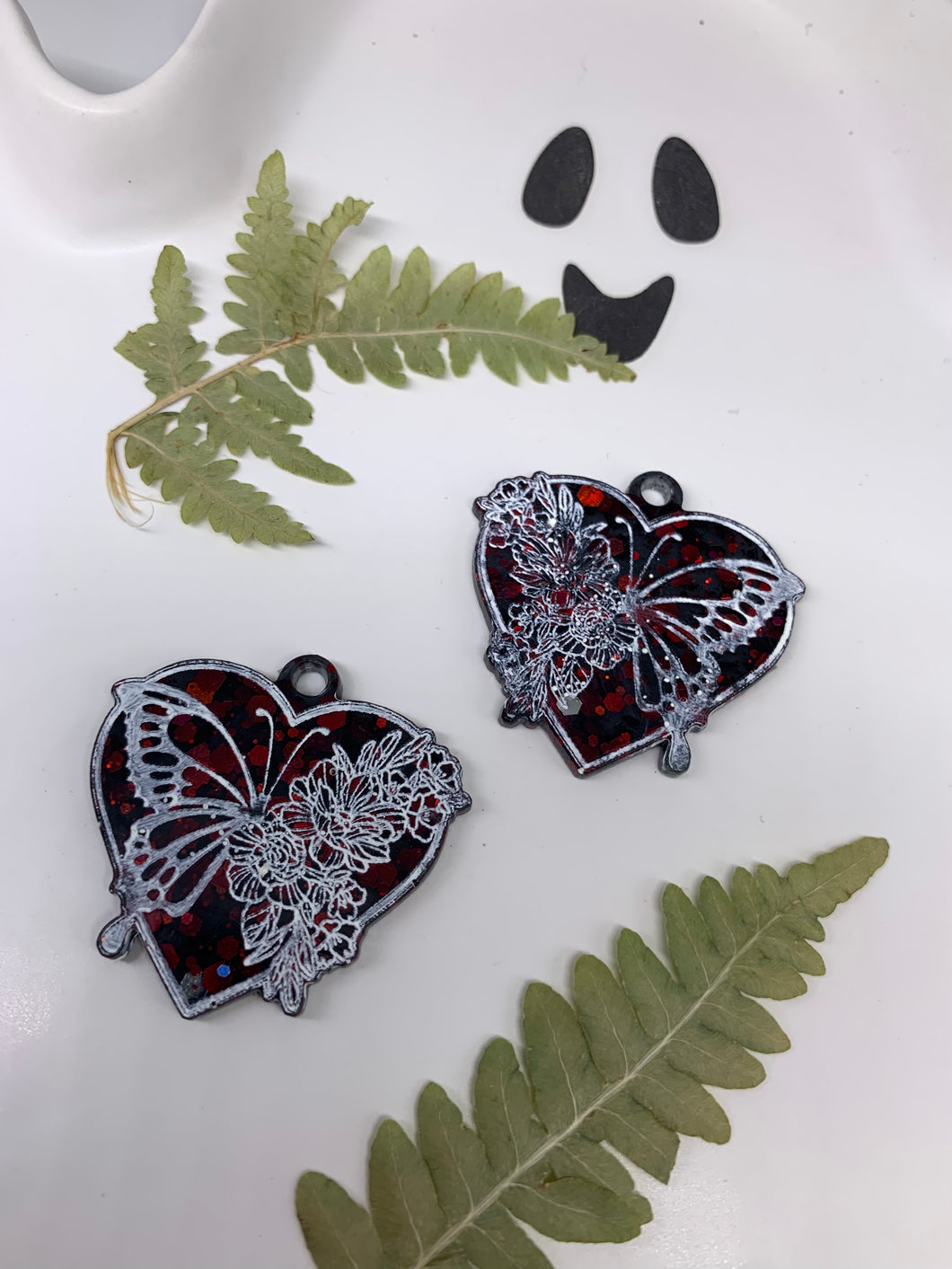 Red and black butterfly heart earrings