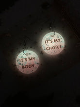 Load image into Gallery viewer, Pink glow in the dark “my body my choice” earrings
