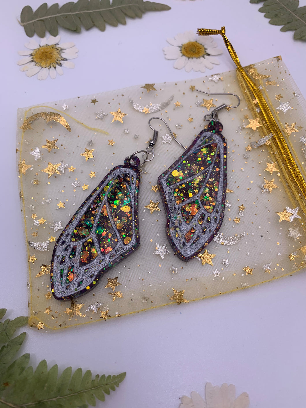 Black glitter wing earrings