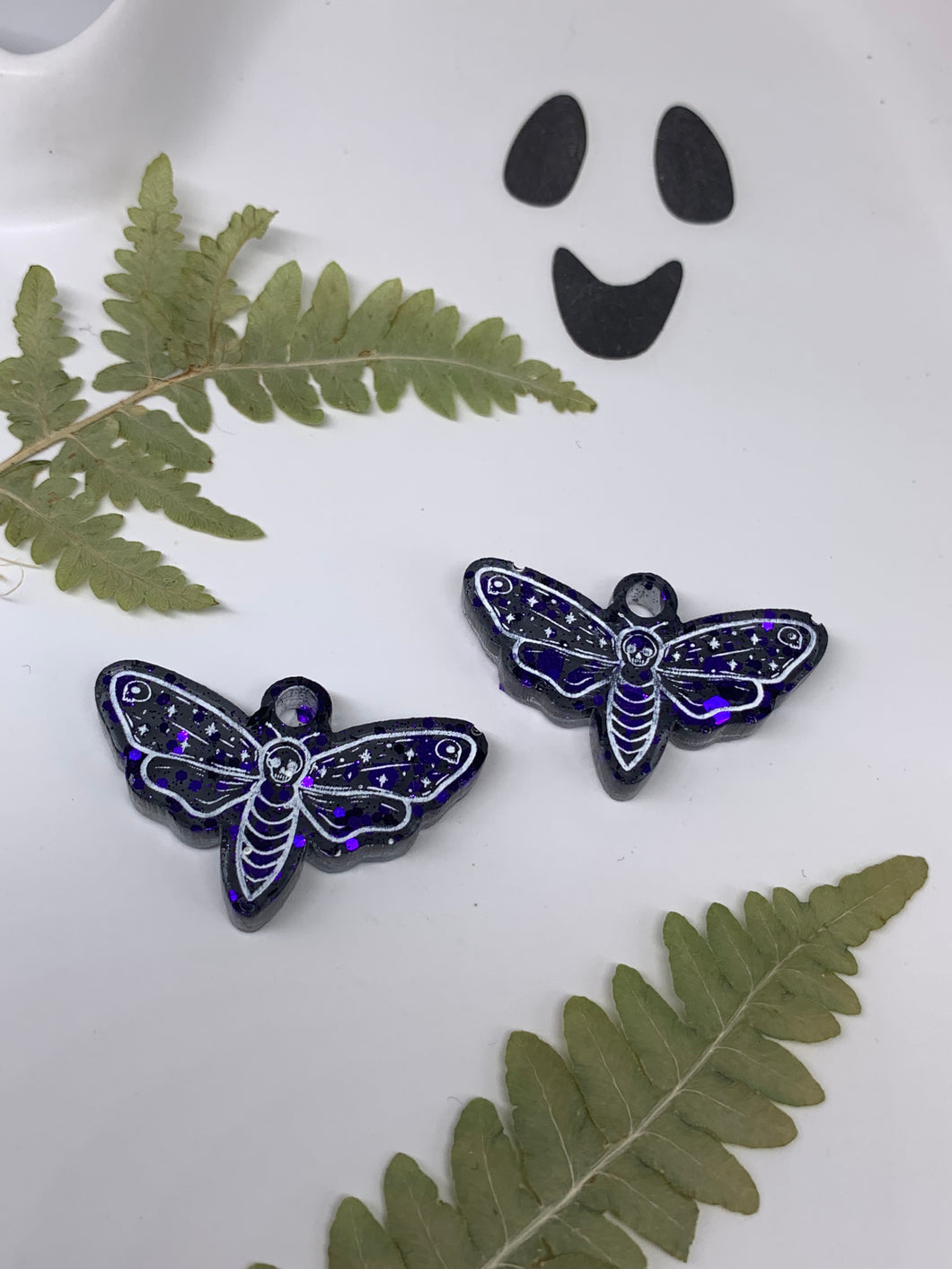 Purple and black moth earrings