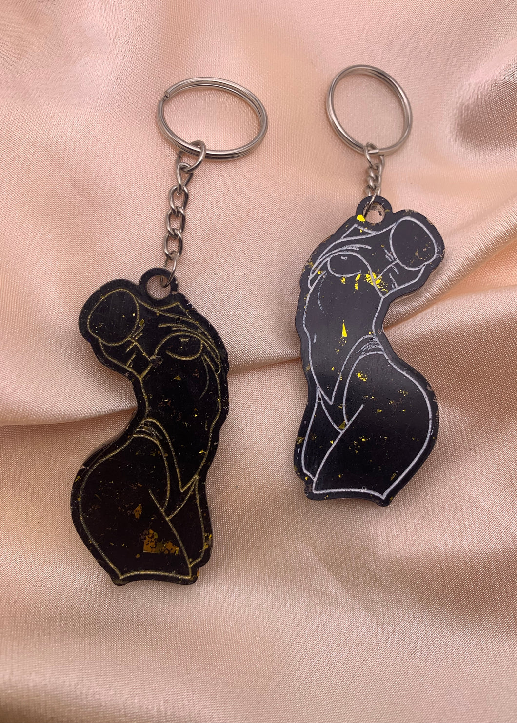 Black and gold lady keychains