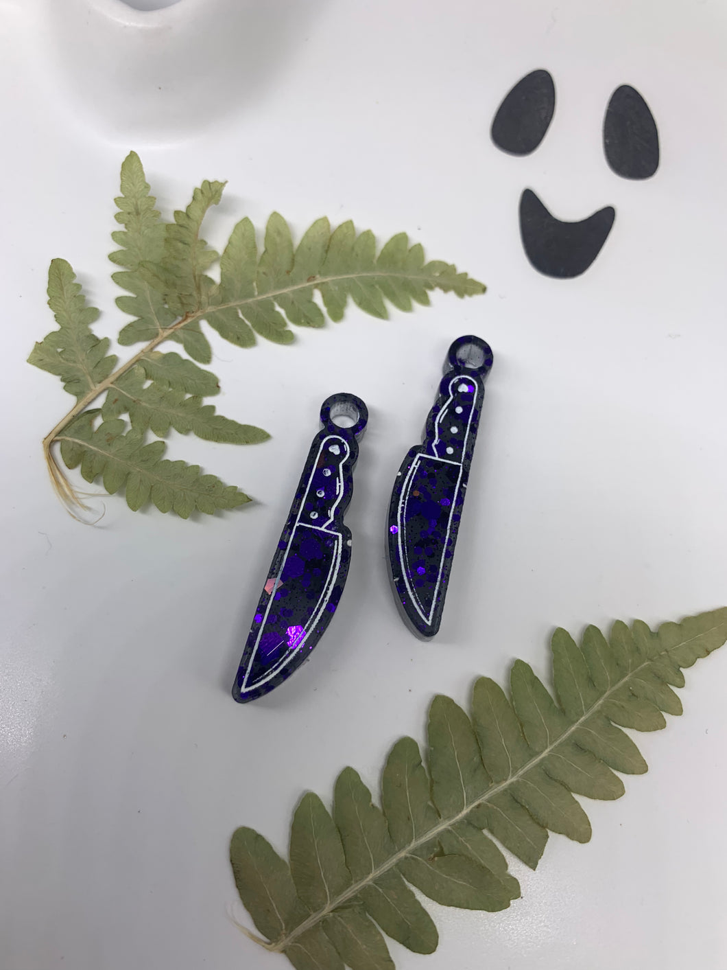 Purple and black knife earrings