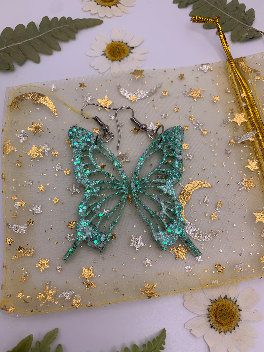 Green dot butterfly wing earrings