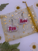 Load image into Gallery viewer, White glow in the dark pro roe earrings
