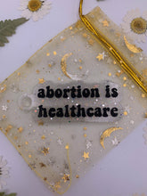 Load image into Gallery viewer, Abortion is healthcare keychains
