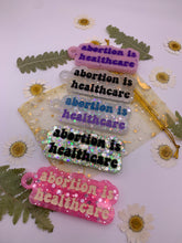 Load image into Gallery viewer, Abortion is healthcare keychains
