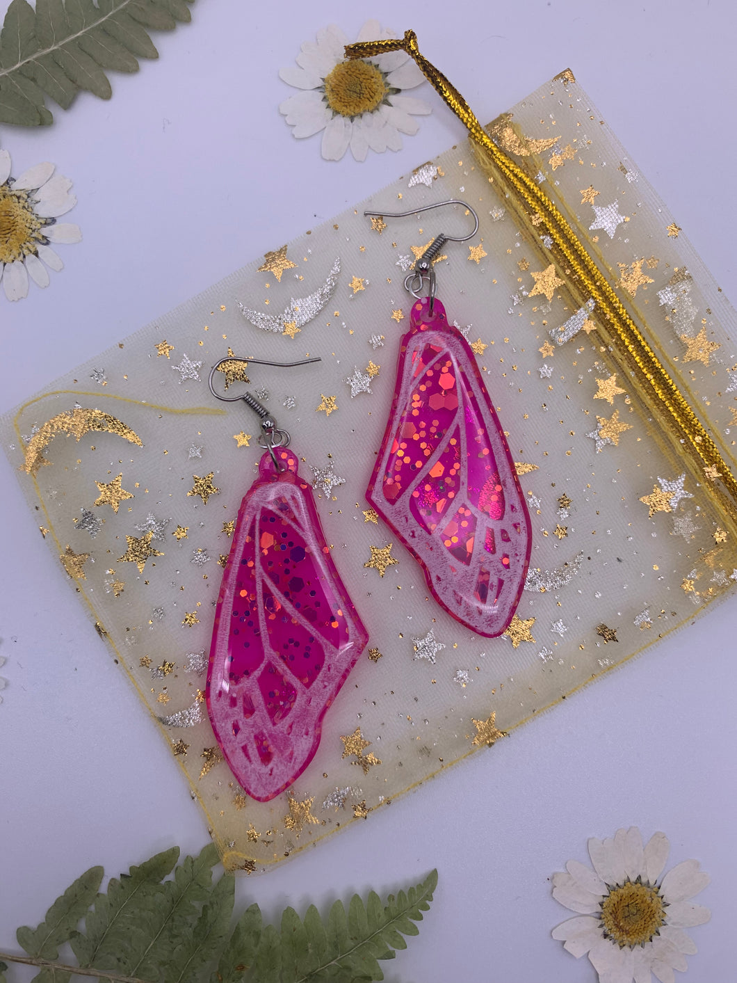 Pink glitter wing earrings