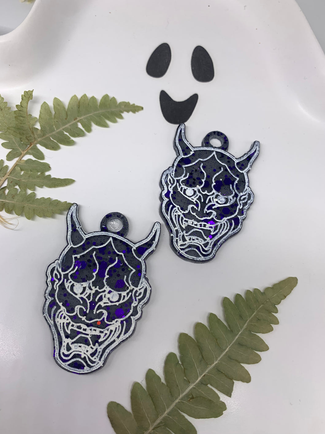 Purple and black demon earrings