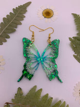 Load image into Gallery viewer, Green and blue glow in the dark butterfly wing earrings
