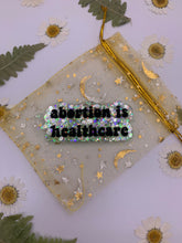 Load image into Gallery viewer, Abortion is healthcare keychains
