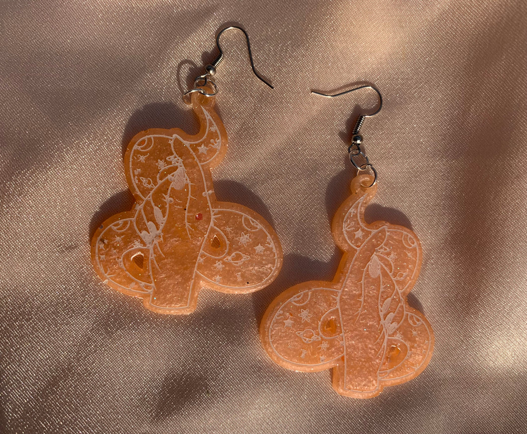 Orange snake hand earrings