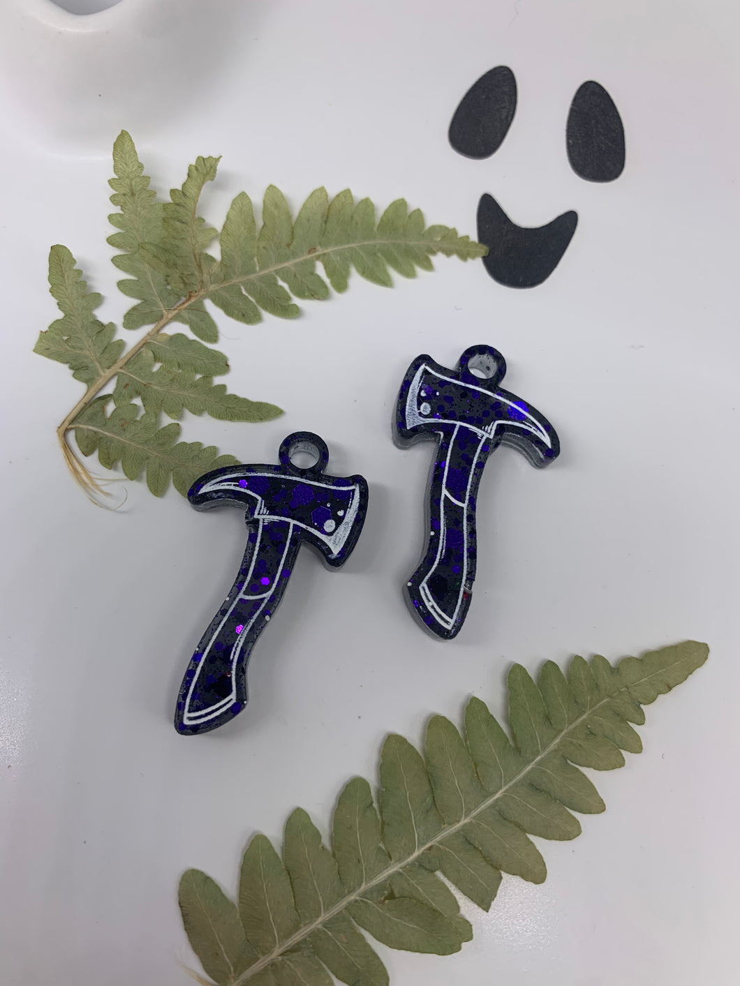 Purple and black axe earrings