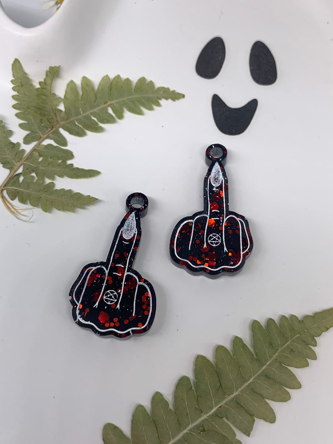 Red and black finger earrings