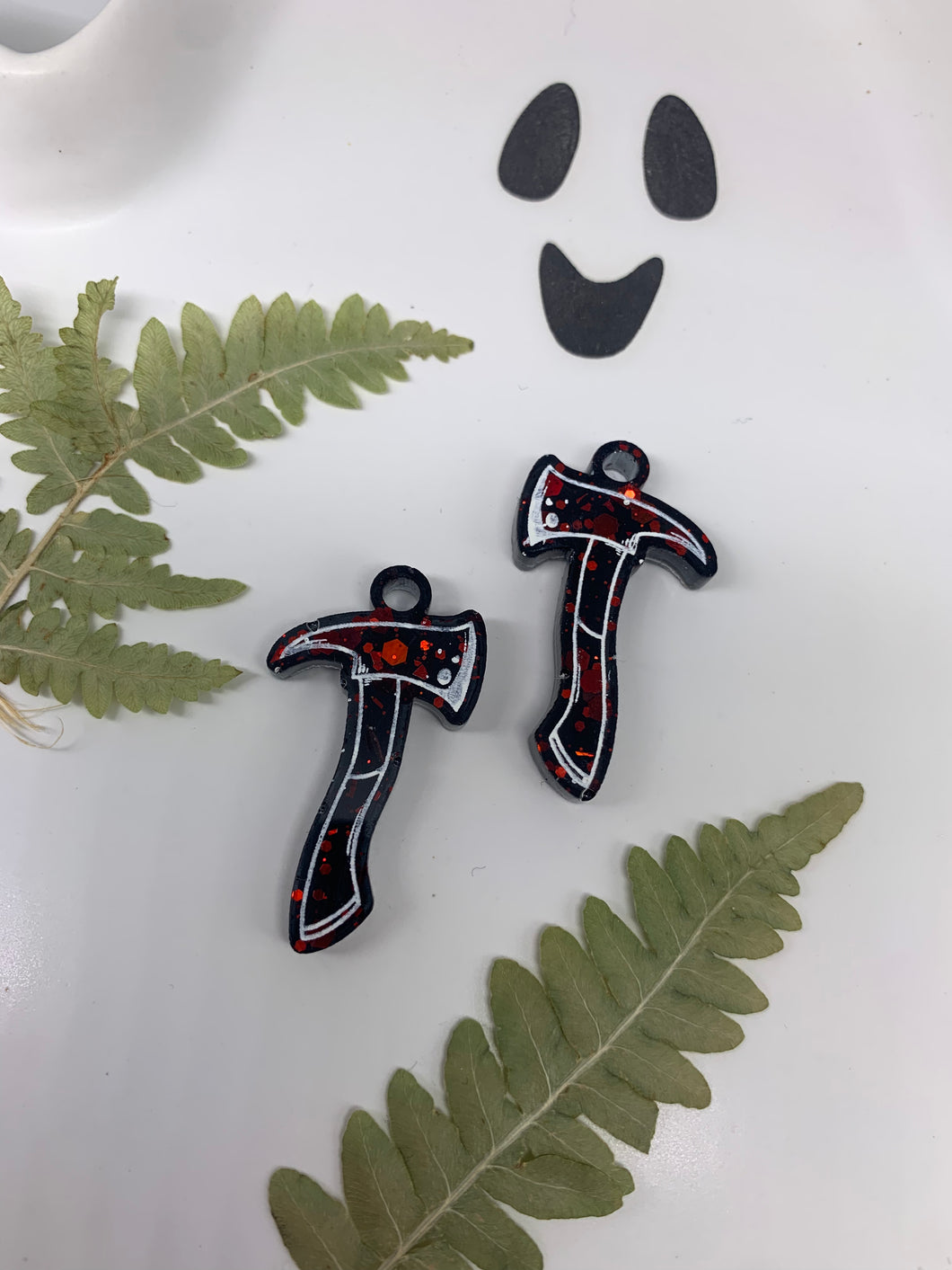 Red and black axe earrings