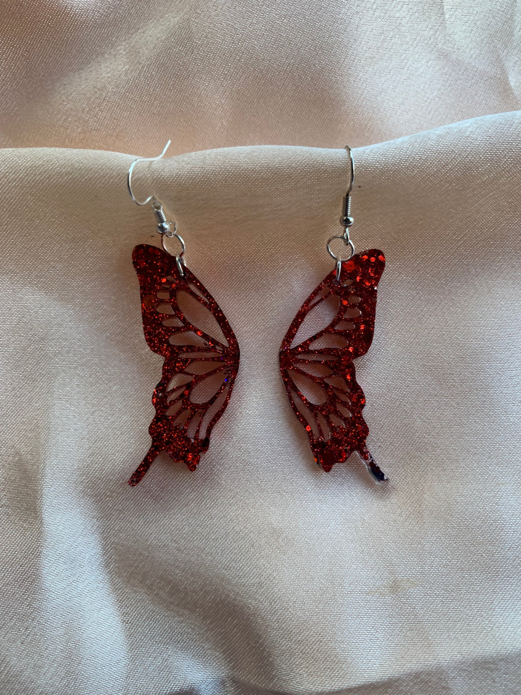 Red glitter butterfly wing earrings