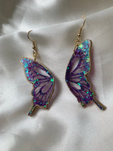 Load image into Gallery viewer, Purple lined in gold butterfly earrings
